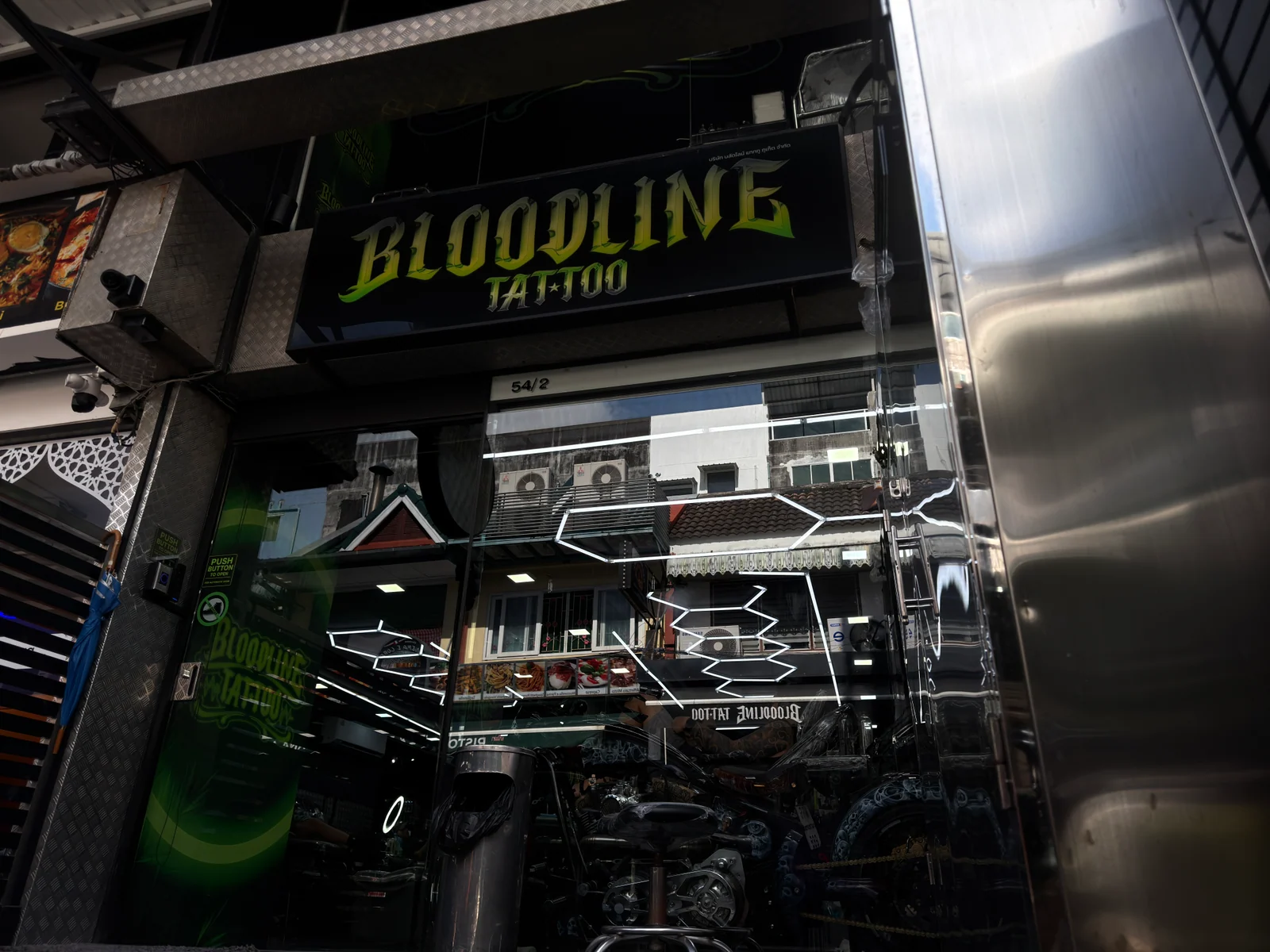 Bloodline Tattoo Phuket studio exterior on the street with signage visible