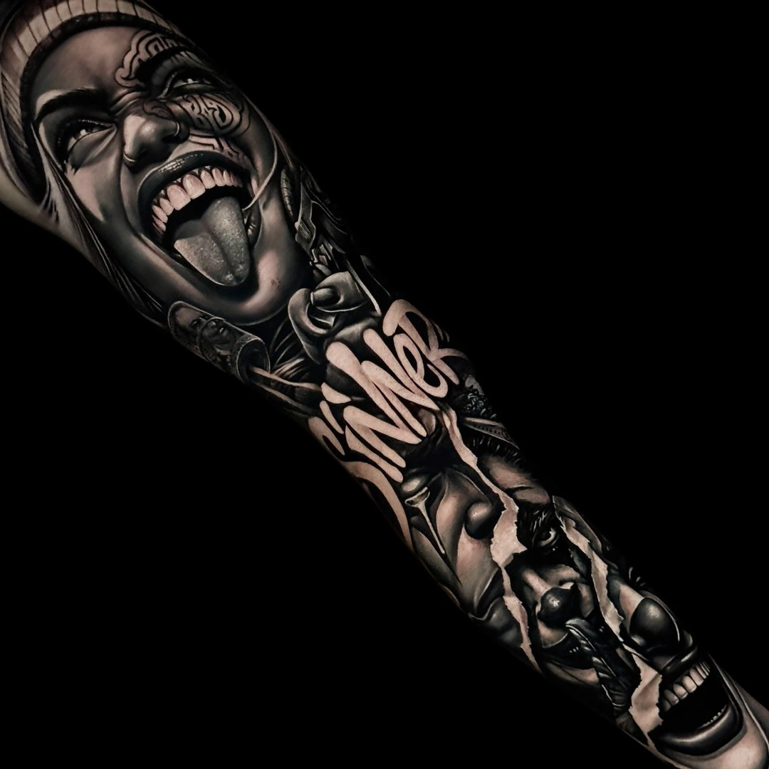 Chicano leg sleeve with Smile Now Cry Later, payasa, LA skyline, lowrider, roses, and praying hands at Bloodline Tattoo Phuket